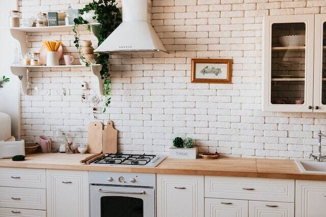 kitchen with brick wall